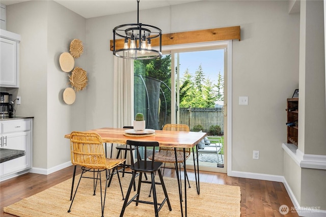 2211 56th St SE, Auburn, WA 98092 - dining area featuring a chandelier and wood finished floors