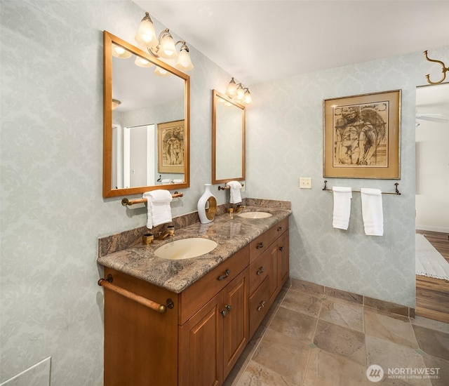 414 Lakeside Ave S Unit 13, Seattle, WA 98144 - bathroom featuring double vanity and wallpapered walls