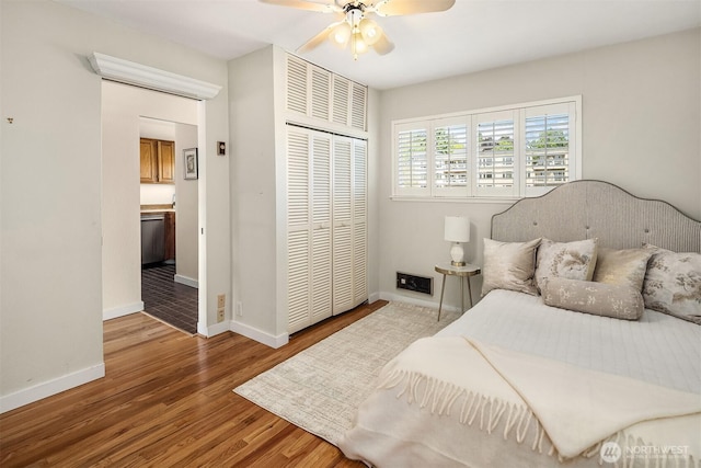 414 Lakeside Ave S Unit 13, Seattle, WA 98144 - bedroom featuring wood finished floors, a closet, and ceiling fan