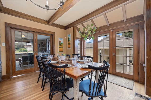 902 Washington St, Wenatchee, WA 98801 - dining room with beam ceiling, light wood-type flooring, a chandelier, and french doors