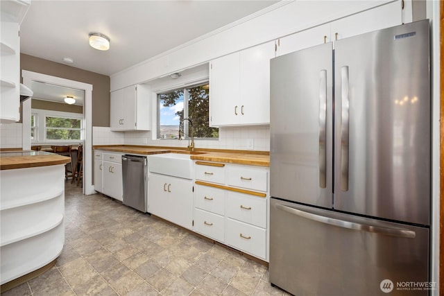 902 Washington St, Wenatchee, WA 98801 - kitchen with stainless steel appliances, butcher block countertops, and open shelves