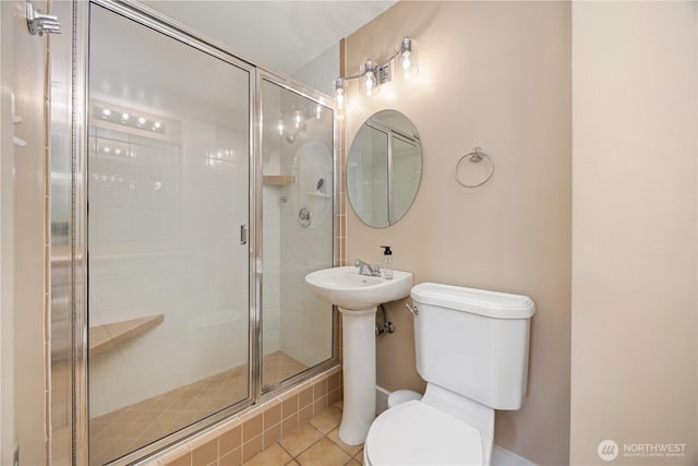 902 Washington St, Wenatchee, WA 98801 - bathroom featuring a shower stall and tile patterned floors