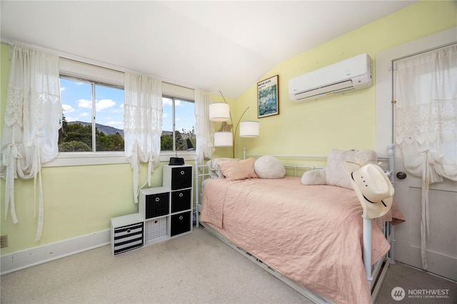 902 Washington St, Wenatchee, WA 98801 - carpeted bedroom featuring a wall mounted AC and lofted ceiling