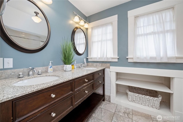 902 Washington St, Wenatchee, WA 98801 - full bath featuring double vanity and marble look tile flooring