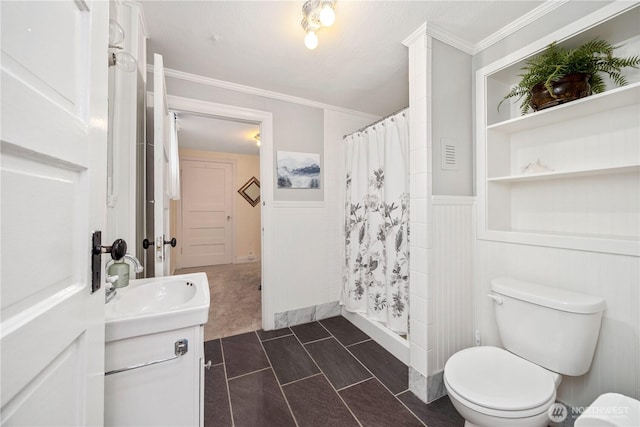 902 Washington St, Wenatchee, WA 98801 - full bathroom featuring vanity, a wainscoted wall, curtained shower, ornamental molding, and tile patterned floors
