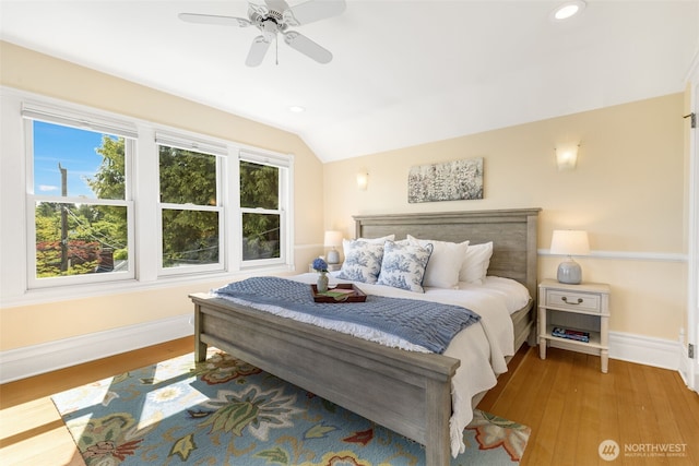 2707 4th Ave W, Seattle, WA 98119 - bedroom featuring wood finished floors, lofted ceiling, recessed lighting, and ceiling fan
