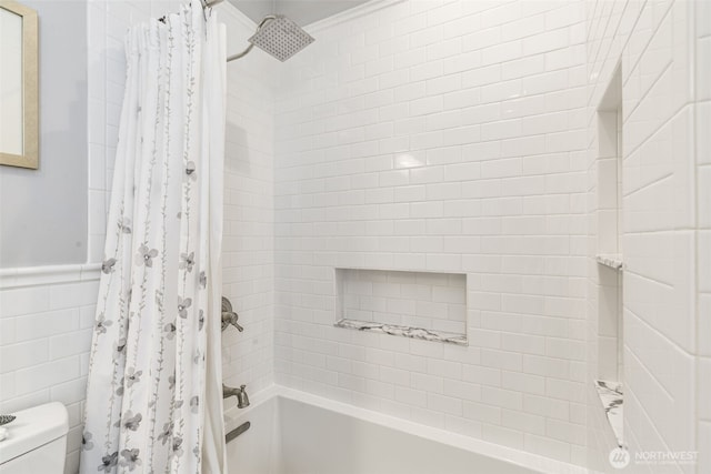 2707 4th Ave W, Seattle, WA 98119 - bathroom featuring shower / tub combo with curtain, wainscoting, and tile walls