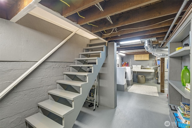 2707 4th Ave W, Seattle, WA 98119 - unfinished below grade area with washing machine and dryer and stairway