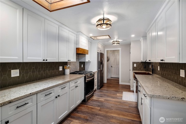 4121 54th Street Ct NW, Gig Harbor, WA 98335 - kitchen featuring stainless steel appliances, decorative backsplash, white cabinetry, dark wood-style floors, and recessed lighting