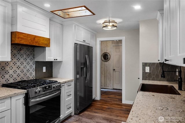 4121 54th Street Ct NW, Gig Harbor, WA 98335 - kitchen with stainless steel appliances, tasteful backsplash, white cabinetry, dark wood-style flooring, and light stone counters