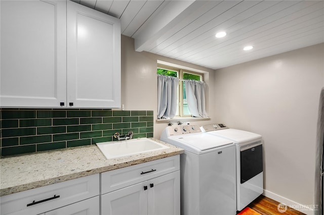 4121 54th Street Ct NW, Gig Harbor, WA 98335 - laundry area with washing machine and clothes dryer, cabinet space, recessed lighting, wood ceiling, and wood finished floors
