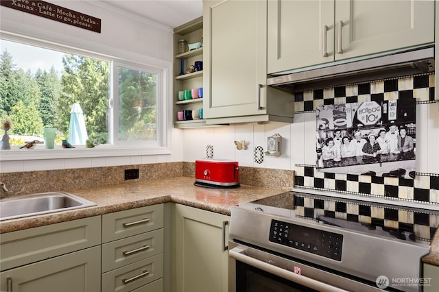 16300 NE State Highway 305 Unit 18, Poulsbo, WA 98370 - kitchen featuring stainless steel range with electric cooktop, tasteful backsplash, open shelves, and crown molding