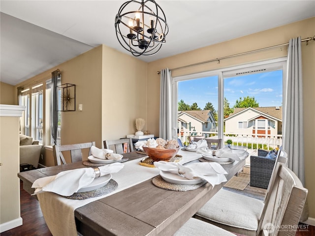 800 96th Ave NE Unit H202, Lake Stevens, WA 98258 - dining room with a chandelier, wood finished floors, and a residential view
