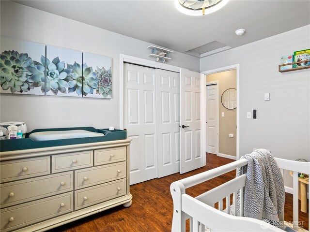 800 96th Ave NE Unit H202, Lake Stevens, WA 98258 - bedroom featuring dark wood-style flooring and a closet