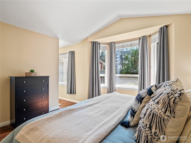 800 96th Ave NE Unit H202, Lake Stevens, WA 98258 - bedroom featuring lofted ceiling and baseboards