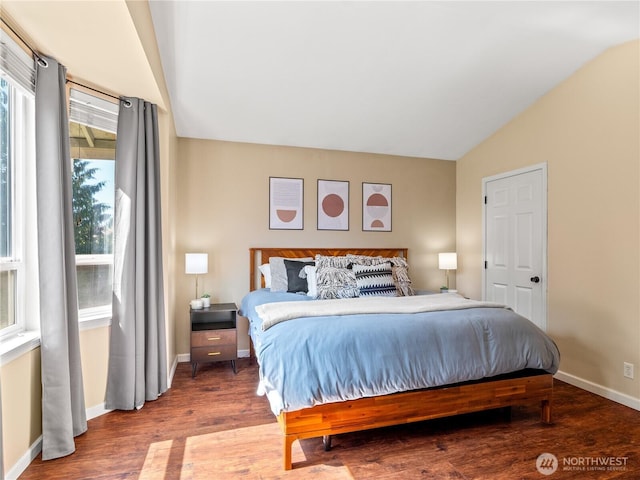 800 96th Ave NE Unit H202, Lake Stevens, WA 98258 - bedroom featuring vaulted ceiling and wood finished floors