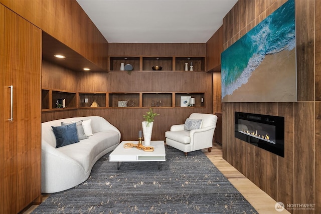 3840 E Mercer Way, Mercer Island, WA 98040 - living area with light wood-type flooring and a glass covered fireplace