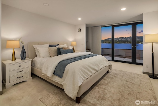 3840 E Mercer Way, Mercer Island, WA 98040 - bedroom with access to outside, light carpet, and recessed lighting