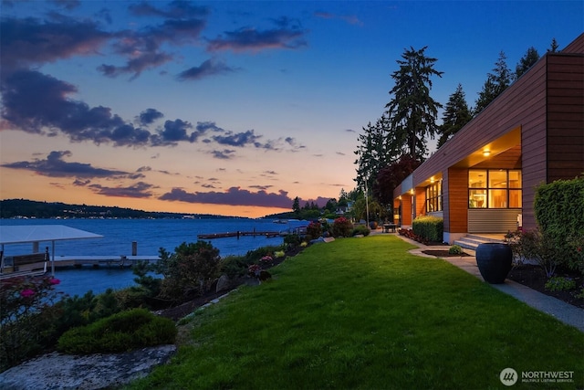 3840 E Mercer Way, Mercer Island, WA 98040 - yard at dusk featuring a yard and a water view
