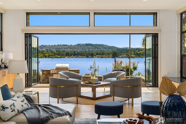 3840 E Mercer Way, Mercer Island, WA 98040 - view of patio featuring an outdoor kitchen and a water view