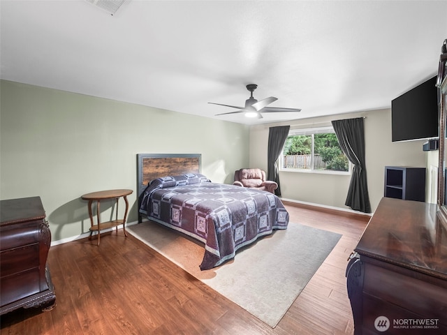 101 E Carols Pl, Belfair, WA 98528 - bedroom featuring wood finished floors and a ceiling fan