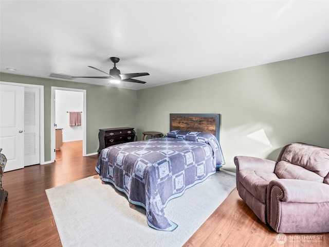 101 E Carols Pl, Belfair, WA 98528 - bedroom featuring wood finished floors and ceiling fan
