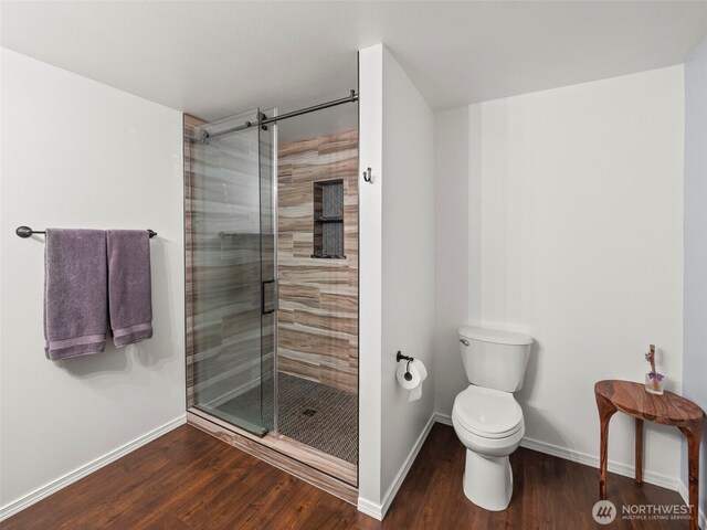 101 E Carols Pl, Belfair, WA 98528 - bathroom with wood finished floors and a shower stall
