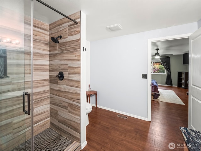 101 E Carols Pl, Belfair, WA 98528 - full bath with a shower stall, wood finished floors, and ceiling fan