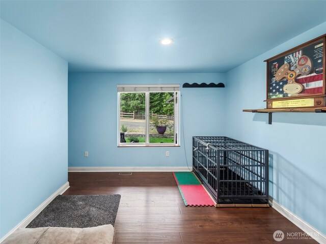 101 E Carols Pl, Belfair, WA 98528 - unfurnished living room with wood finished floors and recessed lighting
