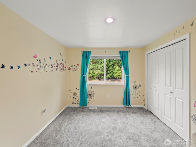 101 E Carols Pl, Belfair, WA 98528 - unfurnished bedroom featuring carpet and a closet