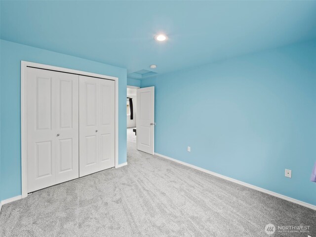 101 E Carols Pl, Belfair, WA 98528 - unfurnished bedroom with carpet, a closet, and recessed lighting