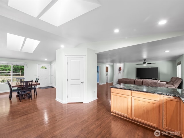 101 E Carols Pl, Belfair, WA 98528 - kitchen with a skylight, open floor plan, dark wood-type flooring, recessed lighting, and ceiling fan