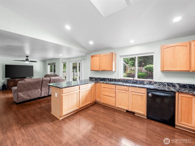 101 E Carols Pl, Belfair, WA 98528 - kitchen with dishwasher, light brown cabinets, dark wood-style floors, vaulted ceiling, and a peninsula