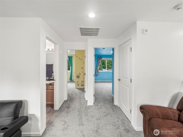 101 E Carols Pl, Belfair, WA 98528 - hallway with light colored carpet and baseboards