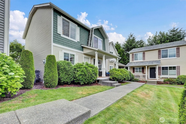 9414 Hancock Ave SE, Snoqualmie, WA 98065 - view of front of home featuring a porch and a front yard