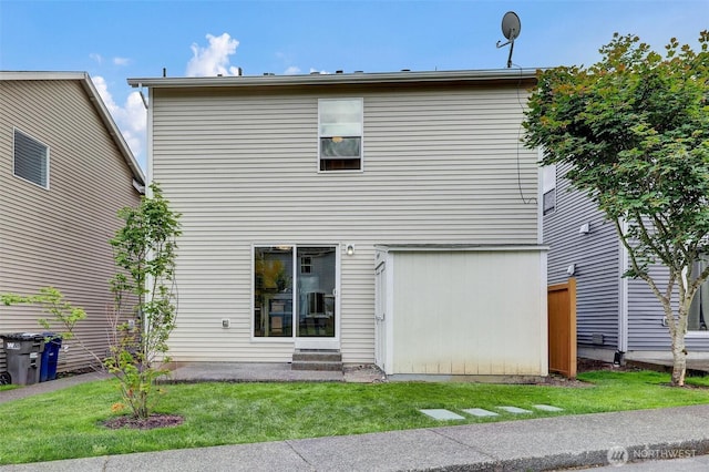 9414 Hancock Ave SE, Snoqualmie, WA 98065 - rear view of house with a lawn and entry steps