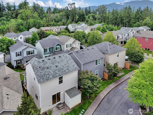 9414 Hancock Ave SE, Snoqualmie, WA 98065 - aerial view of residential area featuring a mountain backdrop