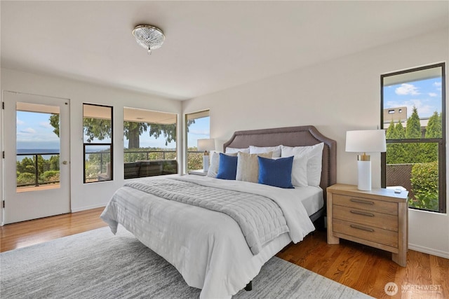 18035 8th Ave NW, Shoreline, WA 98177 - bedroom with wood finished floors and access to outside