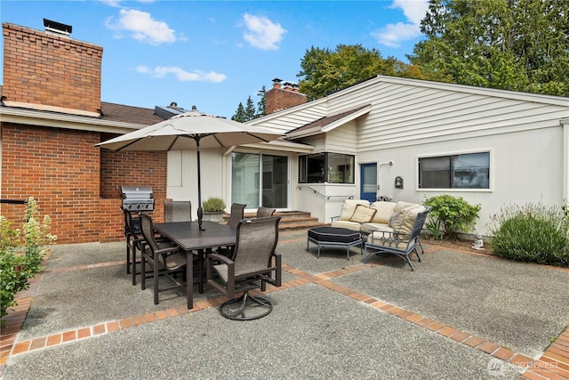 18035 8th Ave NW, Shoreline, WA 98177 - view of patio / terrace with an outdoor hangout area, outdoor dining space, entry steps, and area for grilling