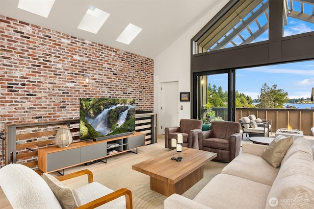 4566 Flying Goat Ave NE Unit C220, Bainbridge Island, WA 98110 - living room featuring a skylight, high vaulted ceiling, brick wall, and wood finished floors