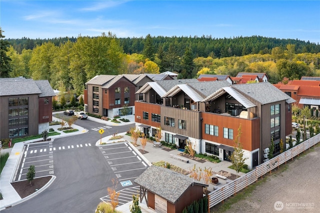4566 Flying Goat Ave NE Unit C220, Bainbridge Island, WA 98110 - bird's eye view of a heavily wooded area