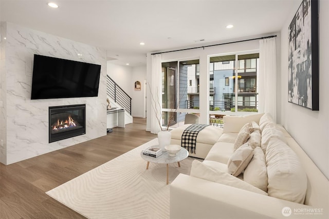 21822 25th Ave SE Unit B, Bothell, WA 98021 - living area with recessed lighting, wood finished floors, and a fireplace