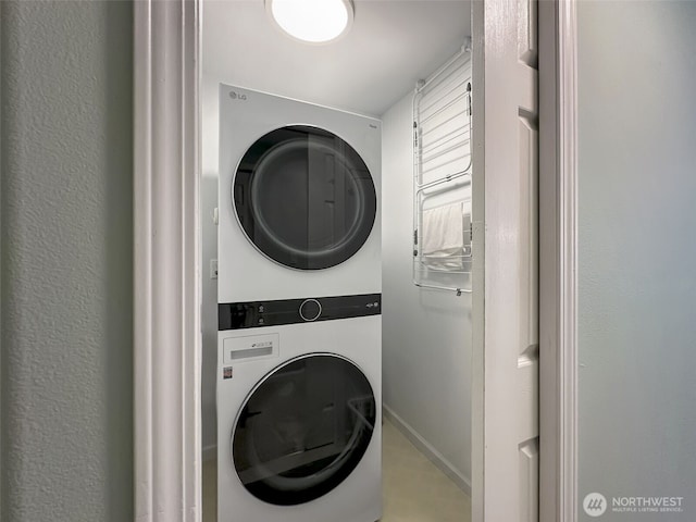 1852 NW Lutes Rd, Poulsbo, WA 98370 - laundry room with estacked washer and dryer and baseboards