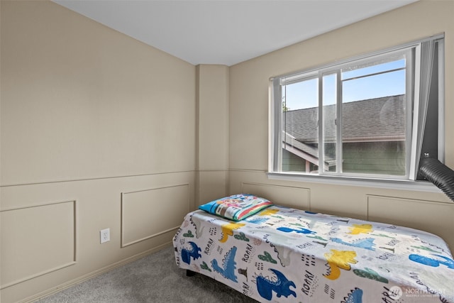 16907 Lookout Mountain Rd SE, Monroe, WA 98272 - bedroom featuring carpet and a decorative wall