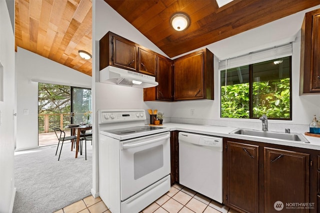 606 N State St, Bellingham, WA 98225 - kitchen with white appliances, under cabinet range hood, vaulted ceiling, wood ceiling, and light countertops