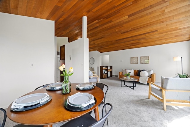 606 N State St, Bellingham, WA 98225 - dining space with wood ceiling, carpet flooring, and vaulted ceiling