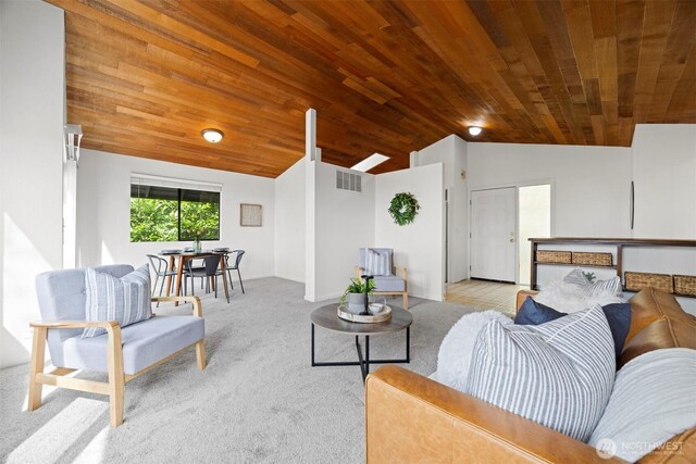 606 N State St, Bellingham, WA 98225 - carpeted living area featuring lofted ceiling and wooden ceiling