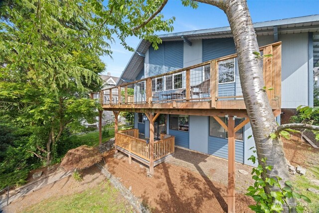606 N State St, Bellingham, WA 98225 - back of property featuring a wooden deck