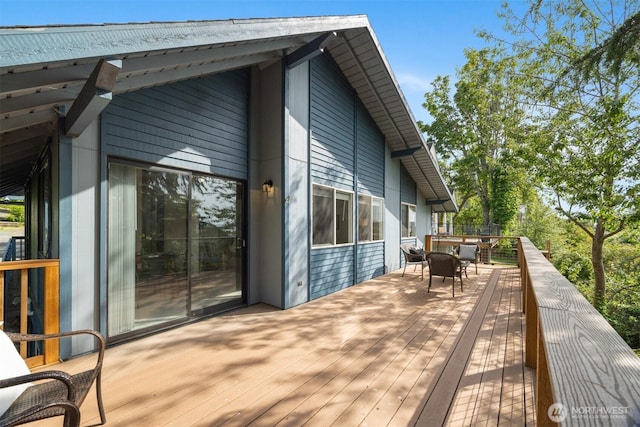 606 N State St, Bellingham, WA 98225 - wooden deck with outdoor dining space