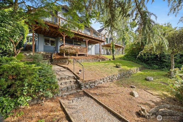 606 N State St, Bellingham, WA 98225 - view of grassy yard featuring a wooden deck